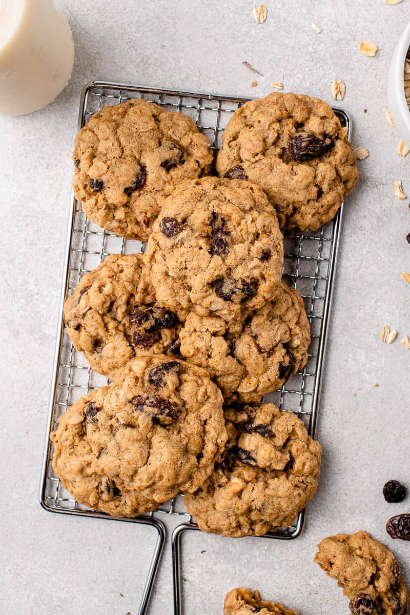 vegan oatmeal raisin cookies on a wire rack by sweet simple vegan