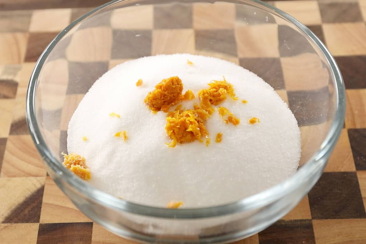 bowl of sugar and orange zest - step by step