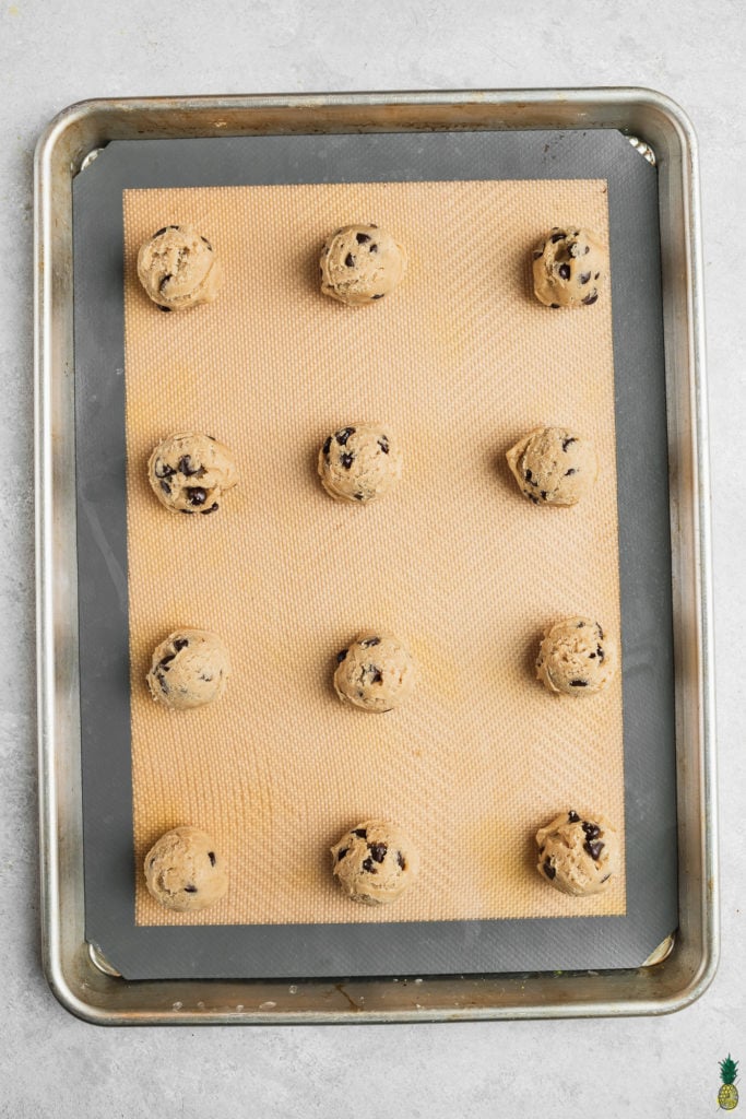 Vegan chocolate chip cookie dough on a baking sheet