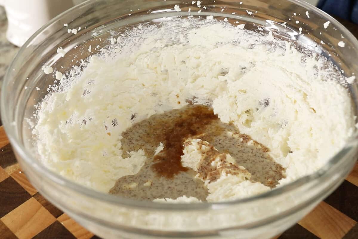 step by step adding spices to creamed butter and sugar