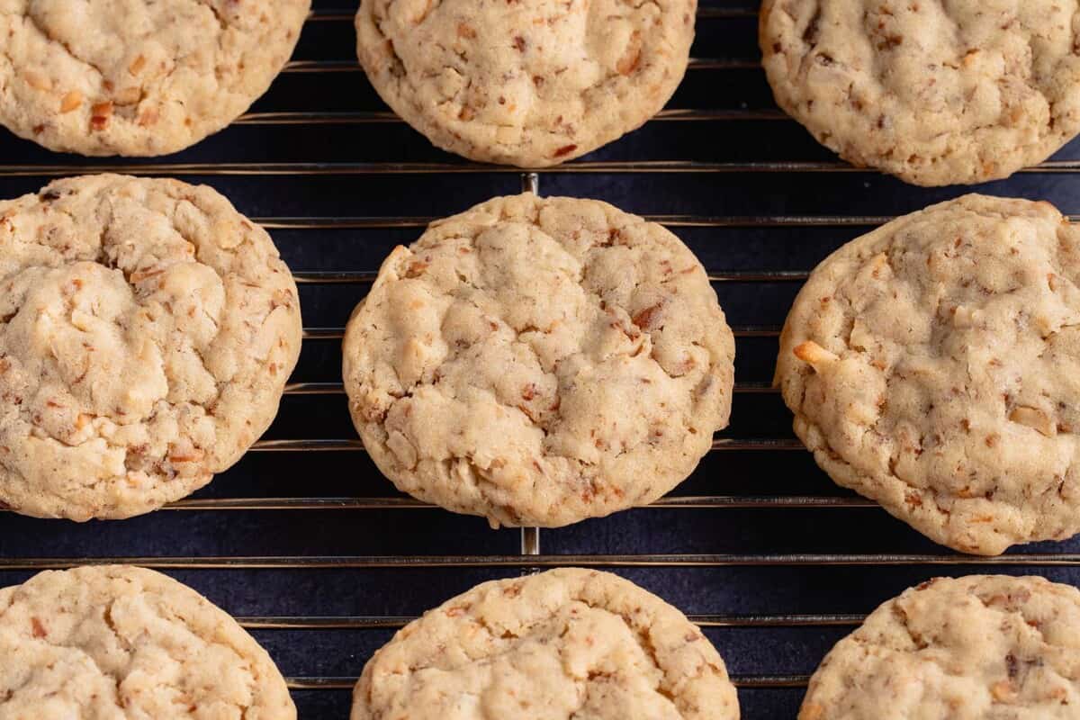 horizontal photo of toasted coconut sugar cookies on wire cooling rack