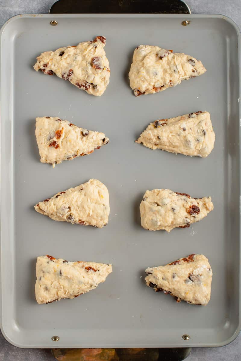 uncooked cherry scones on baking sheet