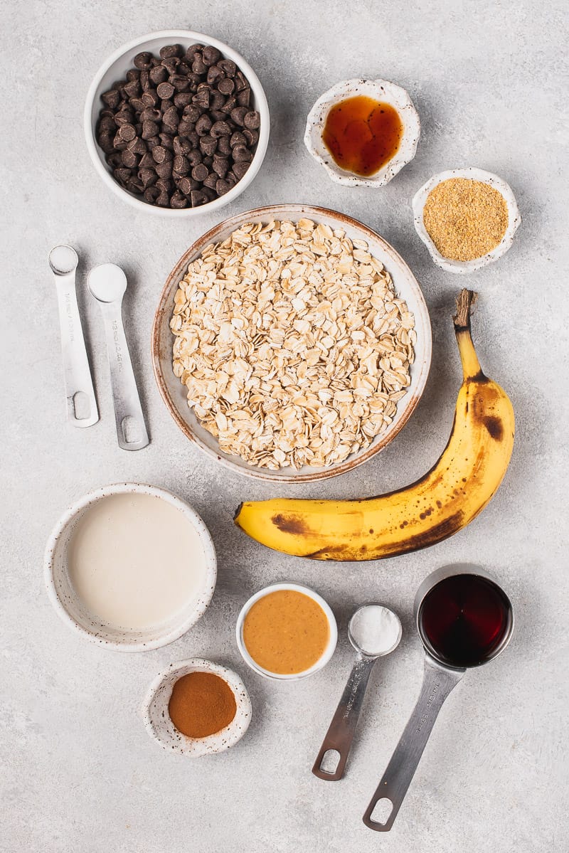 ingredients for chocolate chip baked oatmeal on a gray board