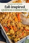 fall-inspired quinoa casserole in large baking dish with spoon for pinterest