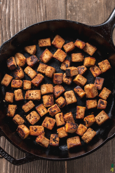 overhead ginger sesame tofu in cast iron skillet