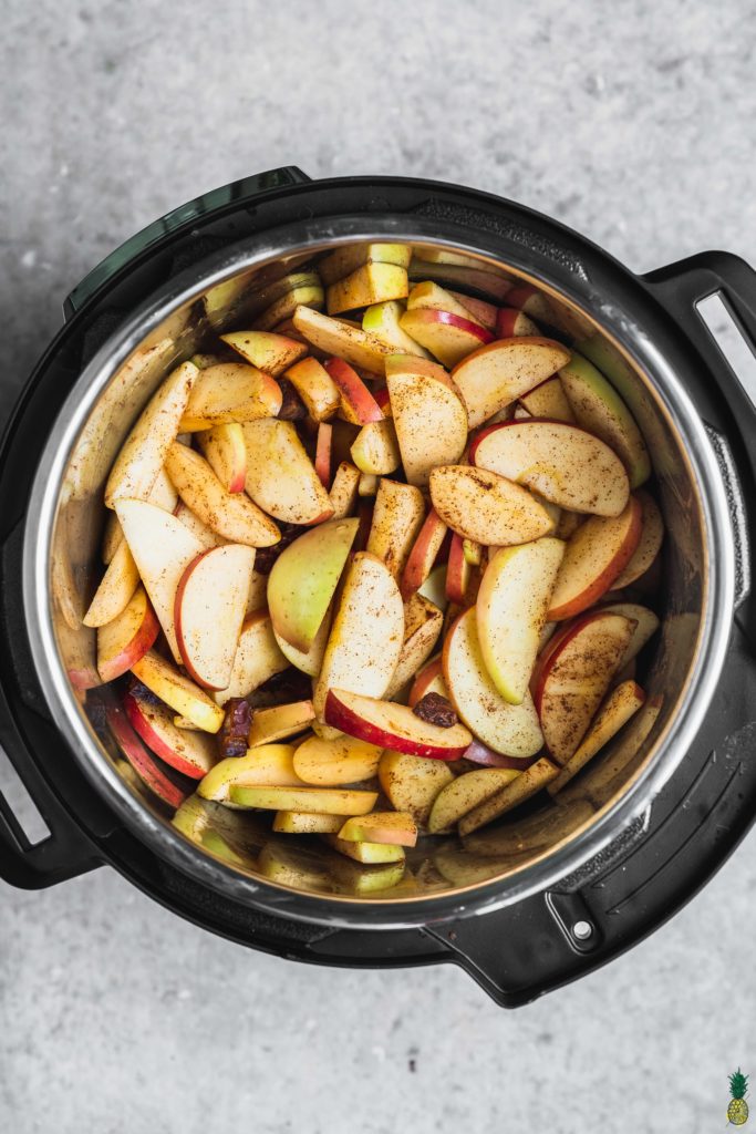 Instant Pot filled with apples to make apple butter