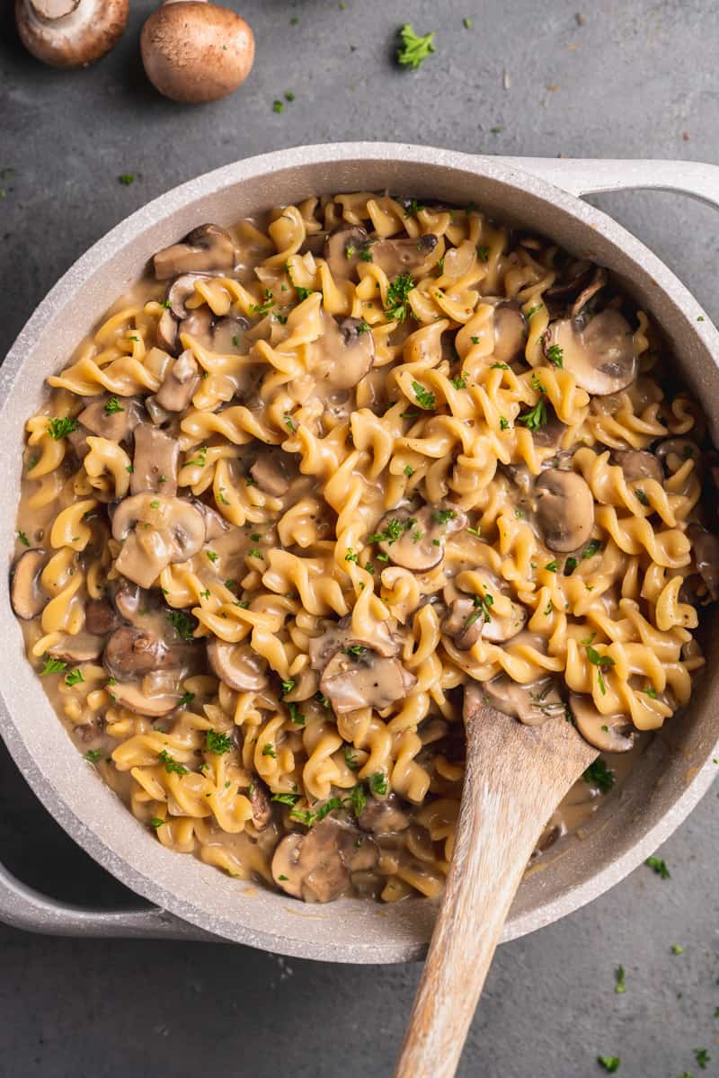 One-Pot Mushroom Stroganoff with a spoon and pot