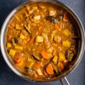 pot of curry on dark background