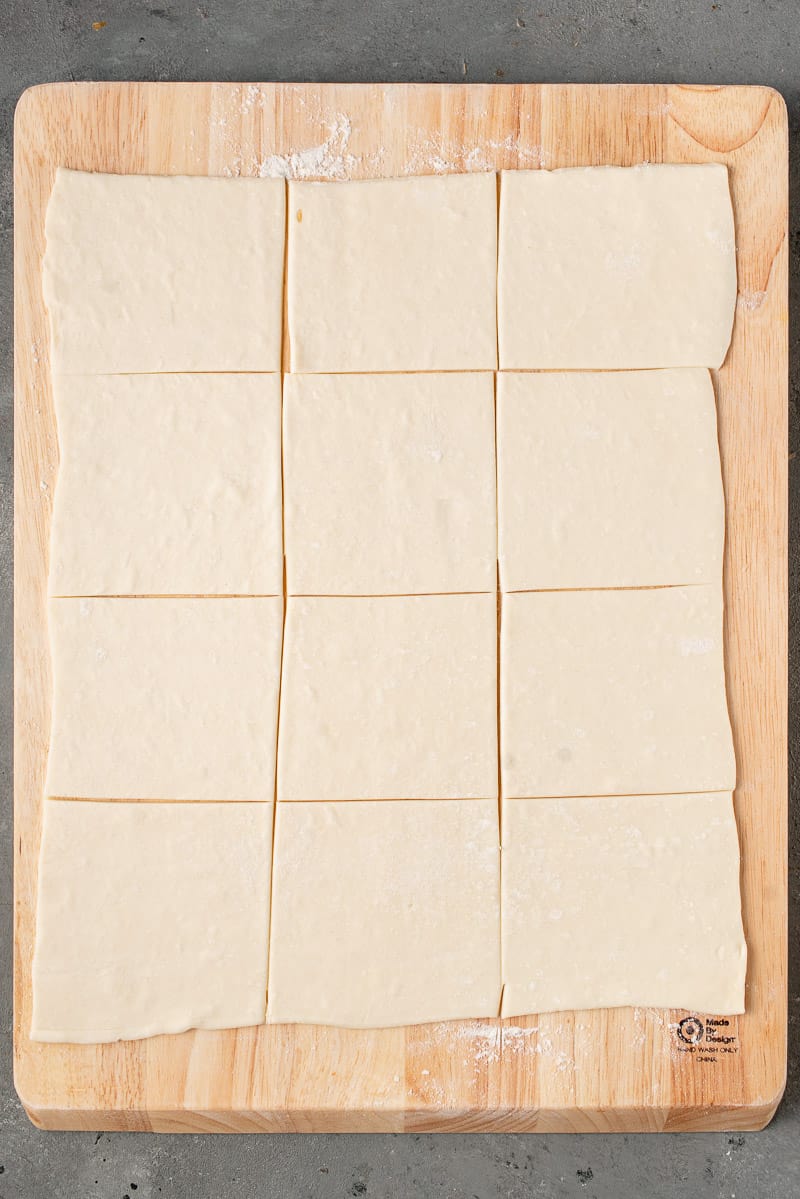 photo of puffed pastry cut into squares