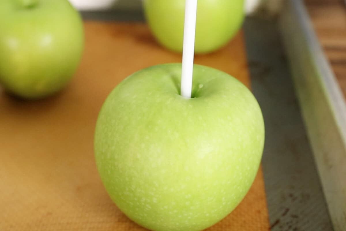 green apple with white stick