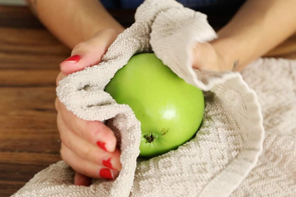 wiping wax off of green apples