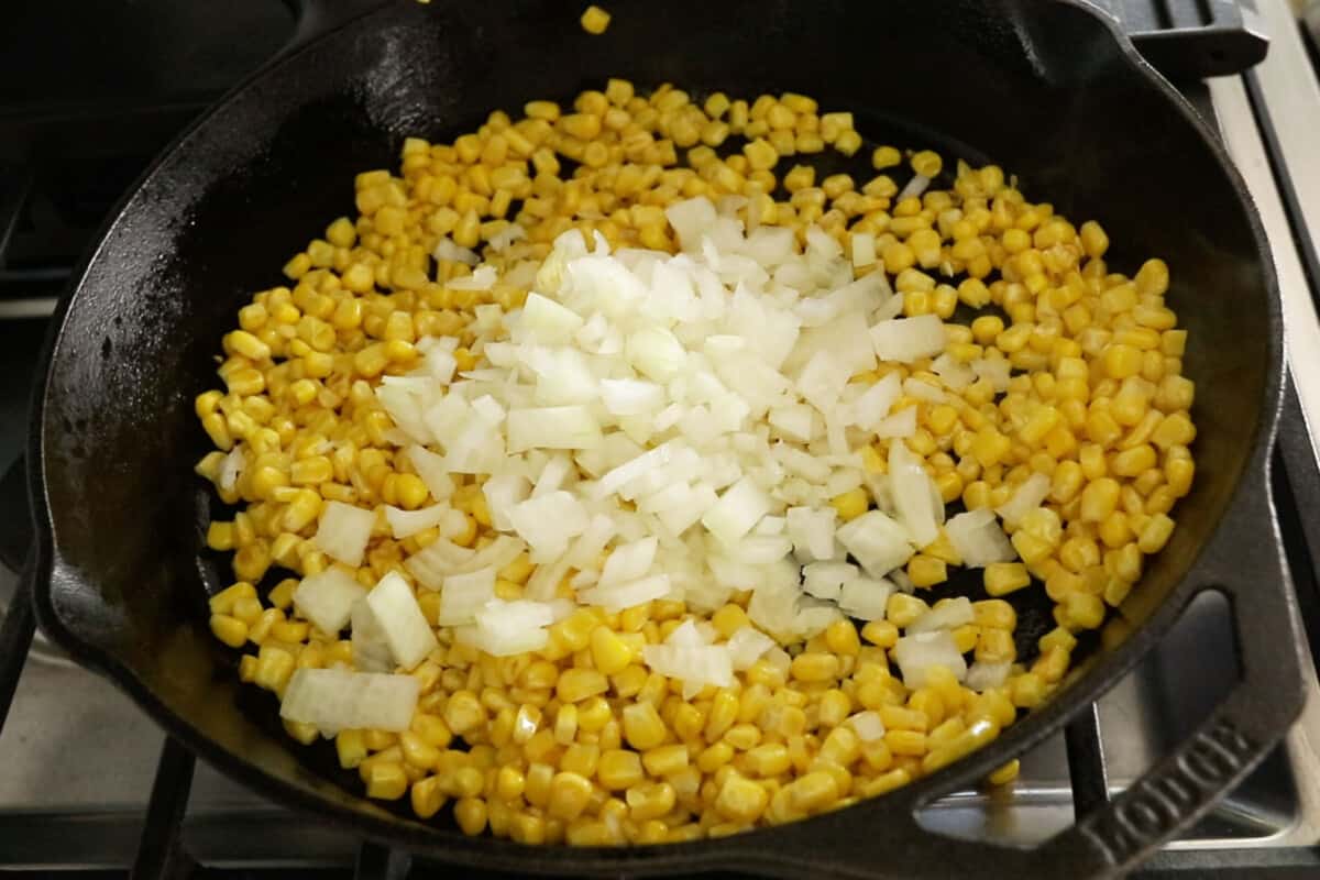 step by step of corn and onions in a pan