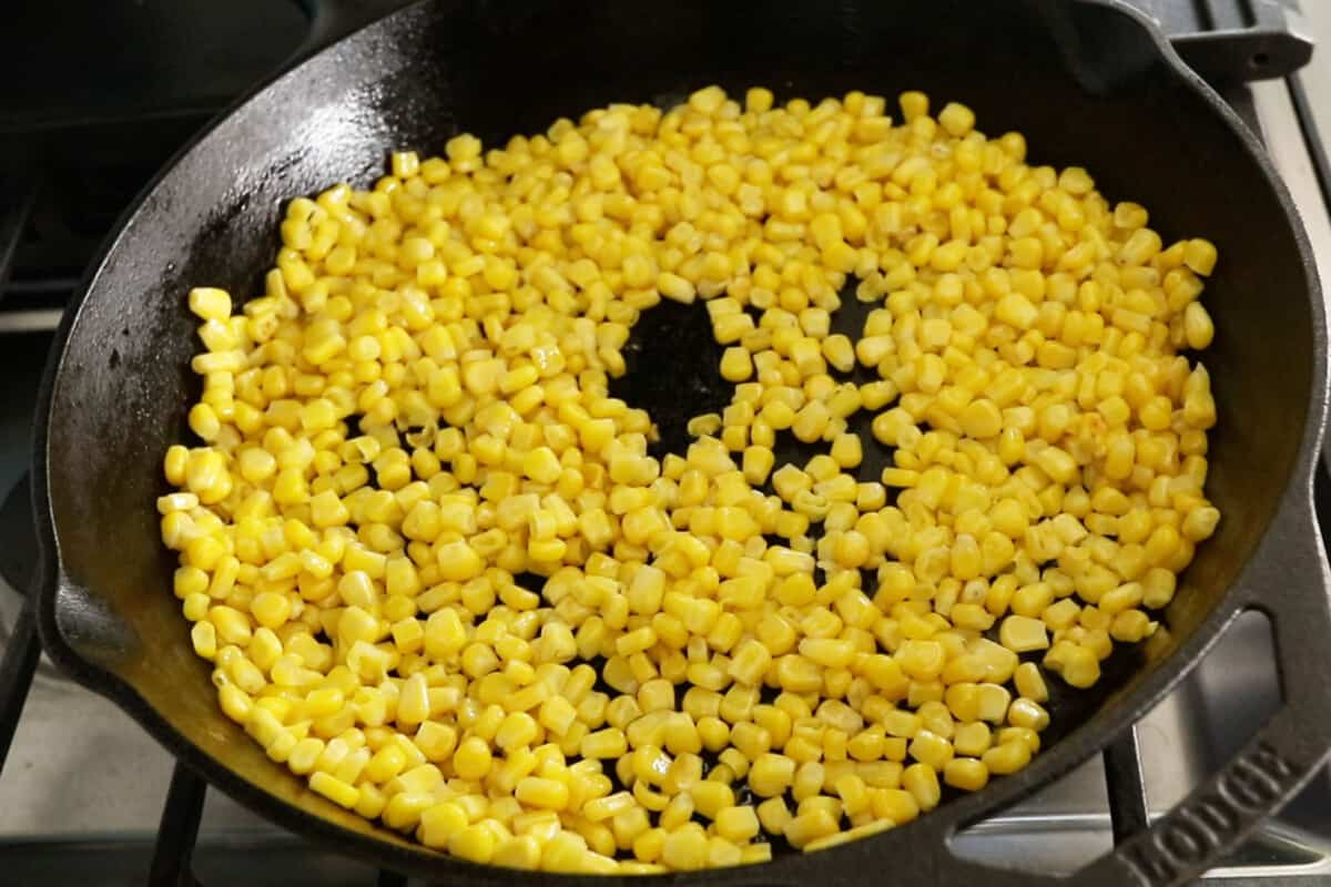 step by step of corn in a pan