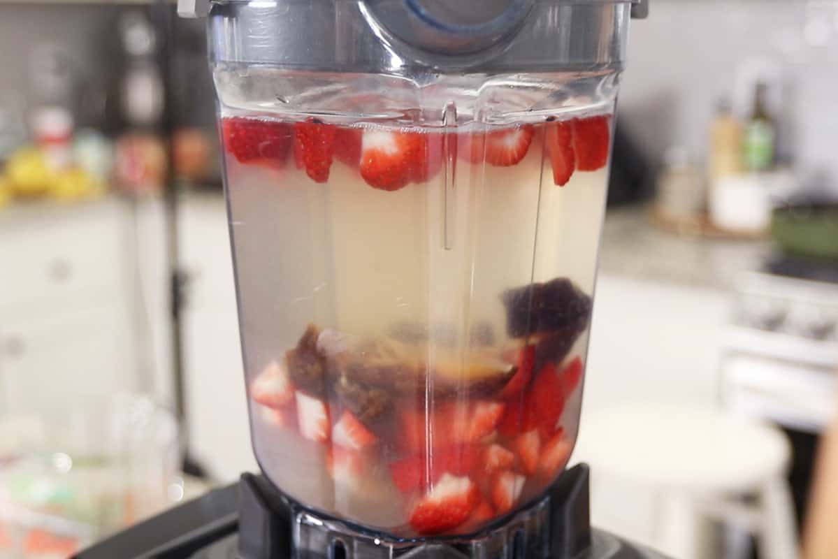 ingredients for homemade strawberry lemonade in a vitamix blender