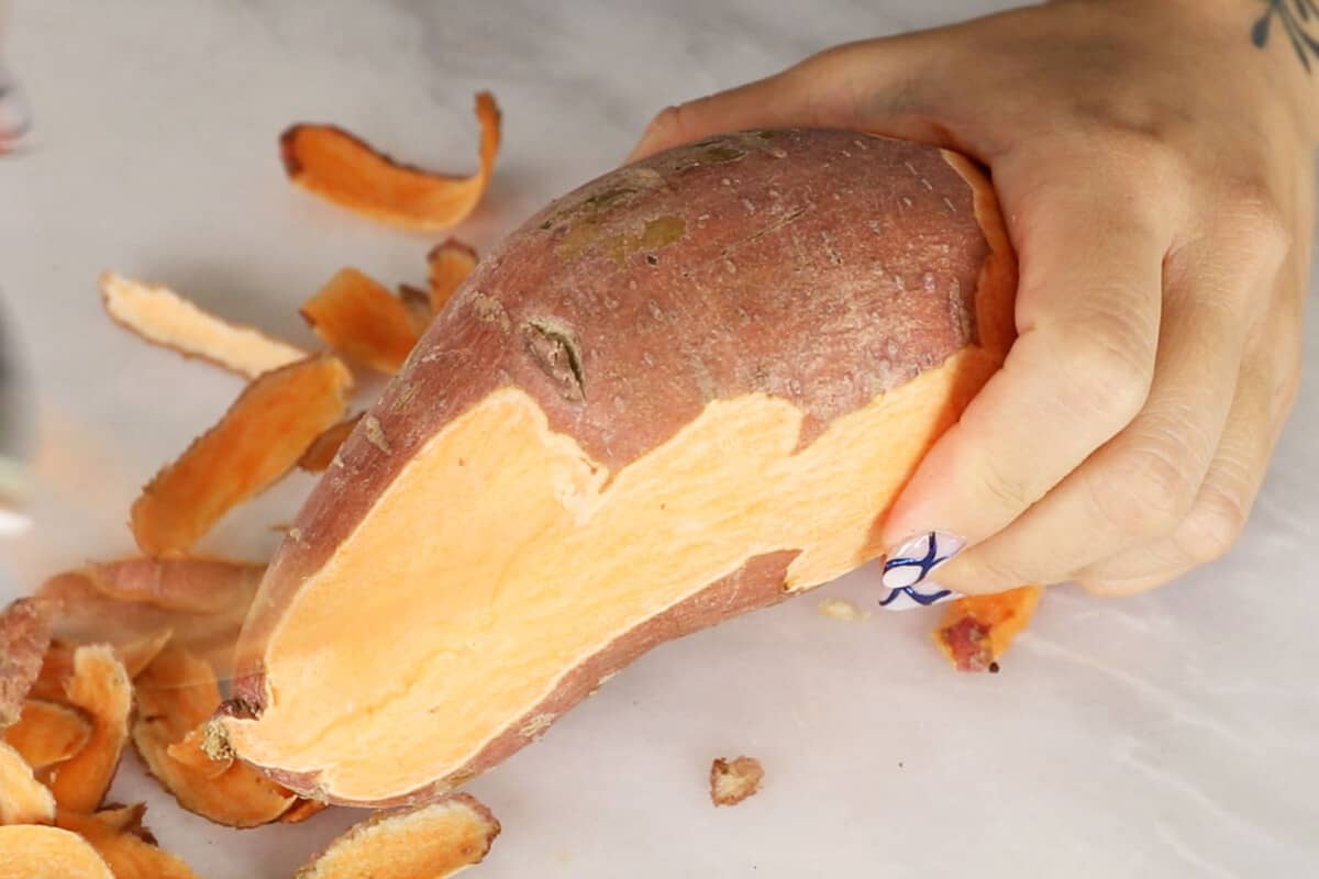 peeling orange sweet potato