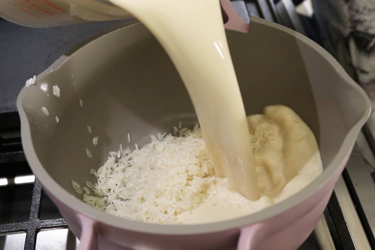 step by step- milk being poured over white rice in a pot