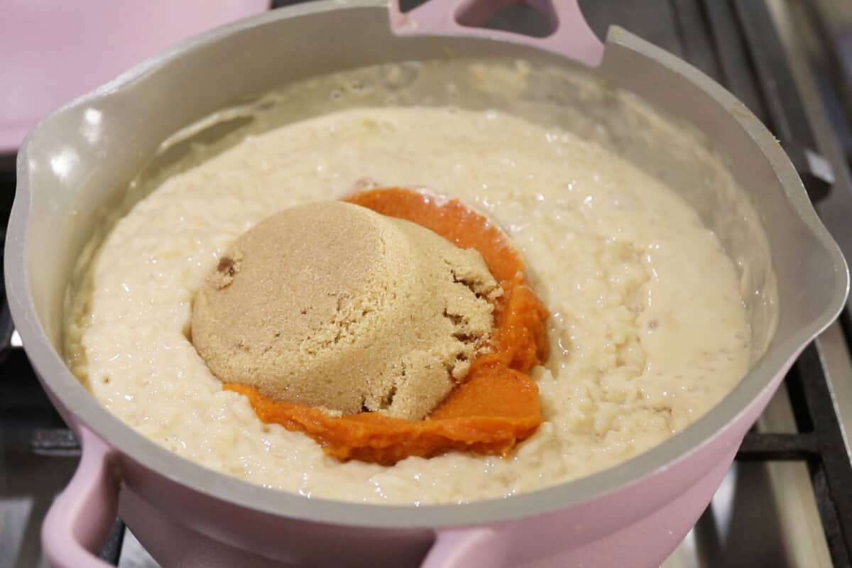 step by step - brown sugar and pumpkin puree dded to a pot of rice pudding