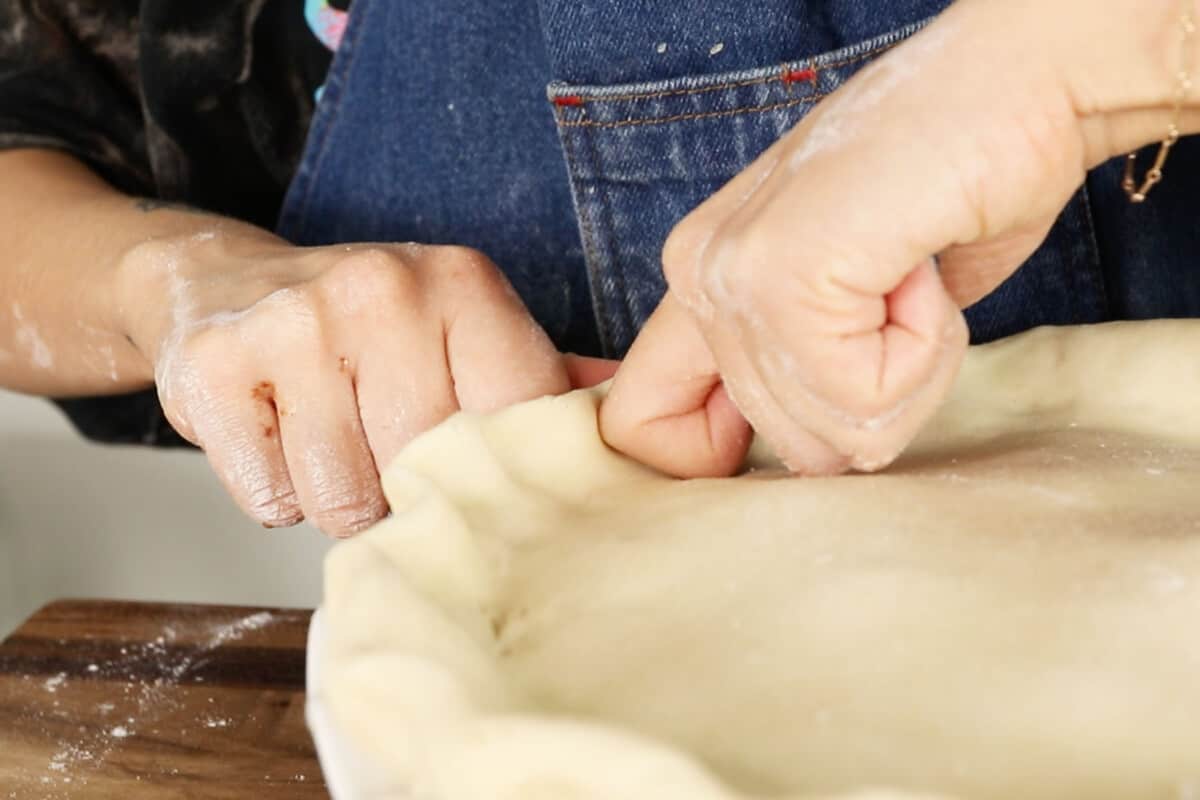 forming pie crust with knuckles
