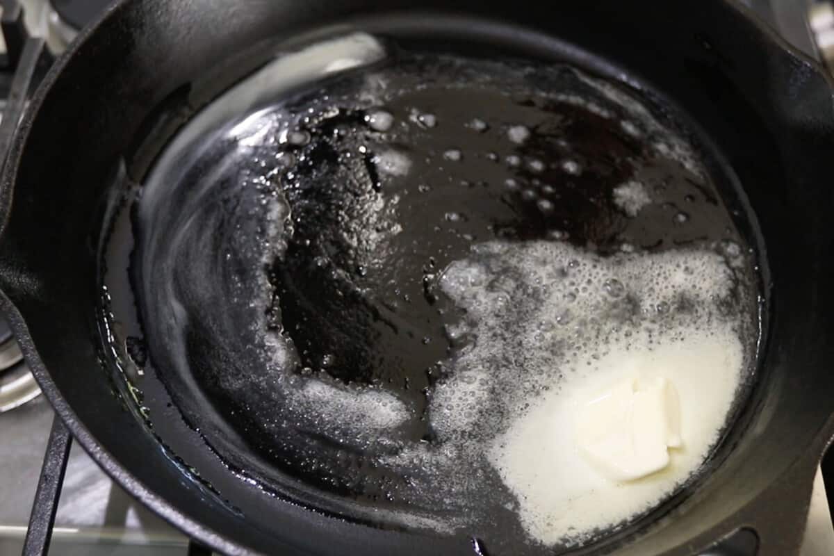 butter melting in cast iron skillet