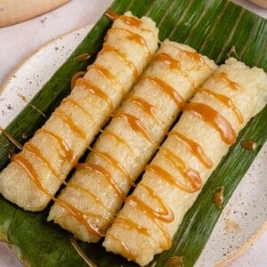 close up of suman malagkit on banana leaf