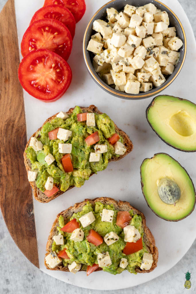 An easy and delicious vegan feta cheese that is made out of tofu and will make all of your dreams come true. This cheese swaps perfectly with its nonvegan counterpart and the possibilities for serving it are endless! #vegan #vegancheese #feta #easy #foolproof #salad #appetizer #side #avocadotoast #veganpasta #veganized #musttry