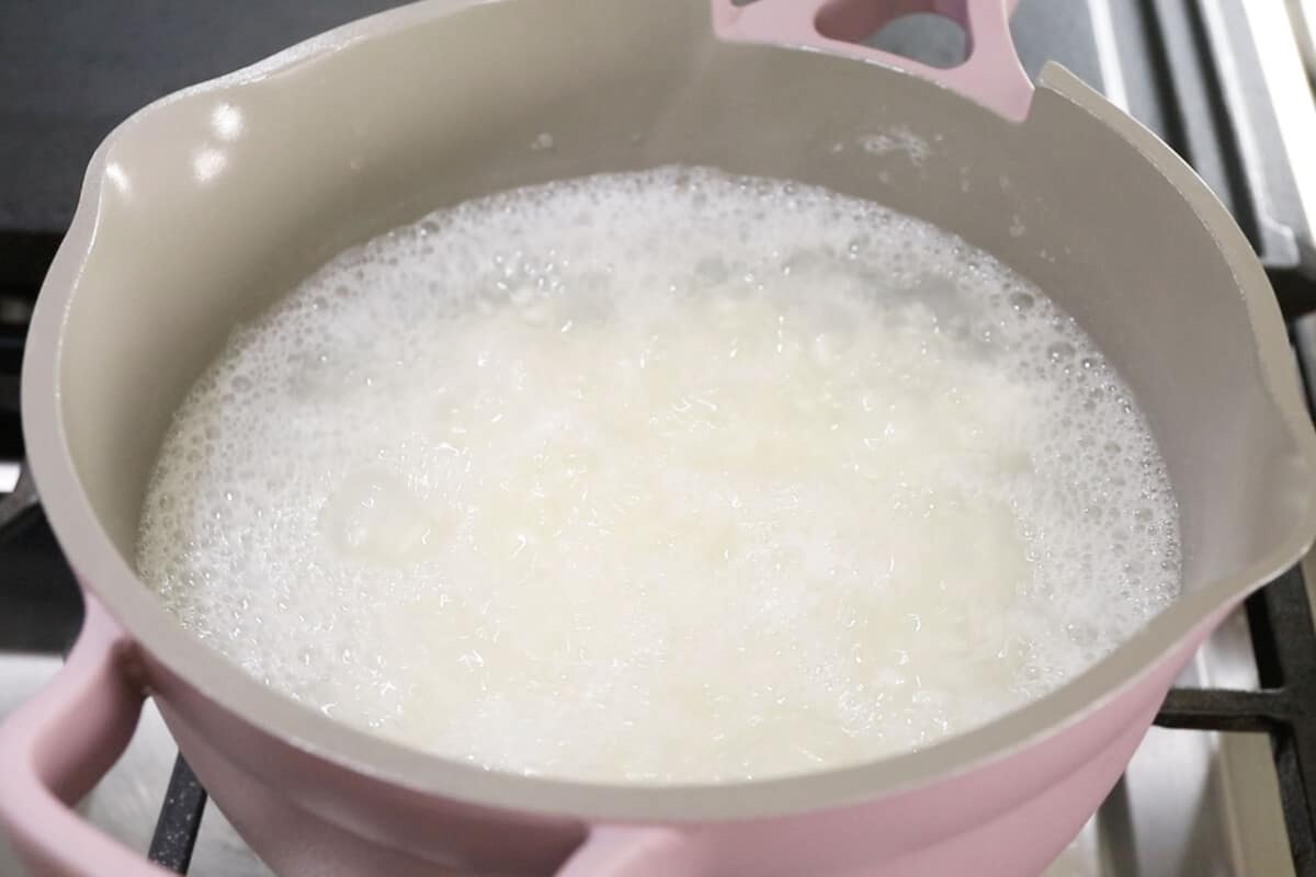 rice cooking in pink pot