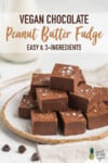 Chocolate peanut butter fudge stacked up on a plate