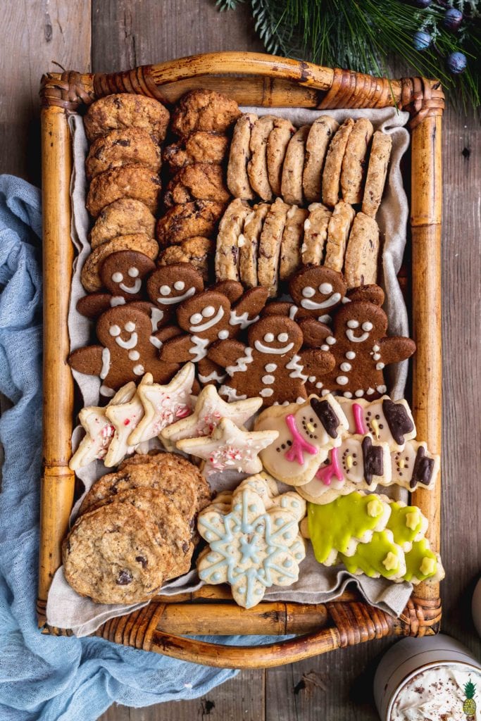 A platter of vegan christmas cookies with shortbread, gingerbread, chocolate chip and sugar cookies