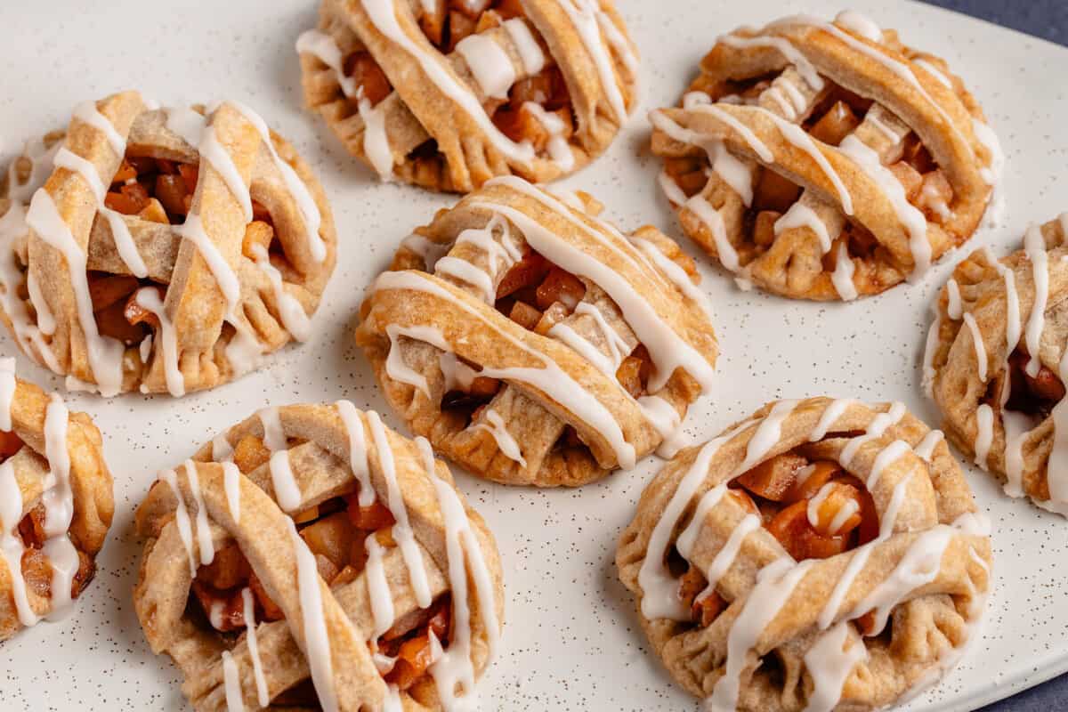 wide image of vegan apple pie cookies on plate