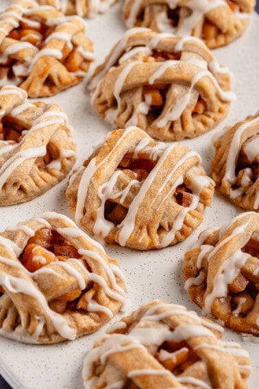 close up image of iced apple pie cookies
