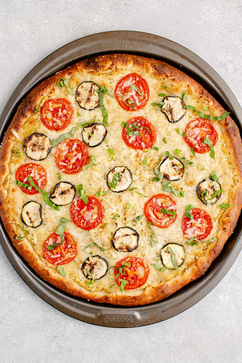 overhead image of white pizza on pizza pan