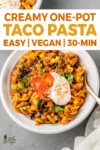 a white bowl of creamy vegan taco pasta and sour cream and tomatoes on top by sweet simple vegan for pinterest